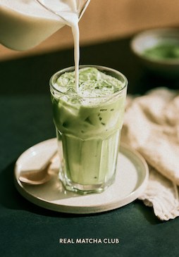 Matcha latte being poured